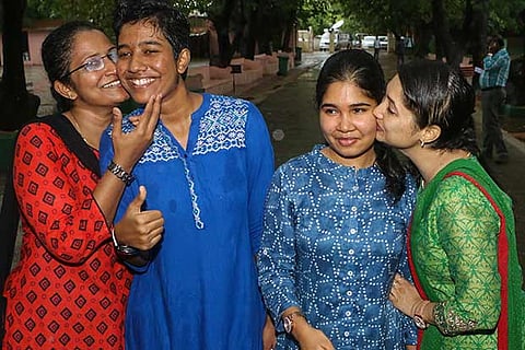 Chathriya Kavin DJ (second left) and S Shruti who bagged the top two ranks (Photo: Justin George)