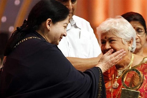 Sowcar Janaki being felicitated by J Jayalalithaa at centenary celebrations of cinema in 2013