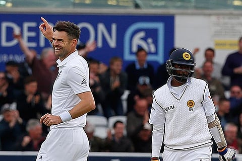 England?s James Anderson celebrates after bowling Lanka?s Nuwan Pradeep to wrap up the innings