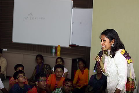 Kirtanya Krishnamurthy interacting with the children