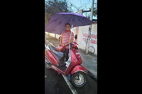 Chennaiites beat the heat with two-wheeler umbrellas