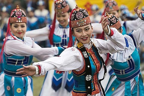 Dancers perform at traditional ceremony, in Ulan Bator, Mongolia, an important part of the Silk Road