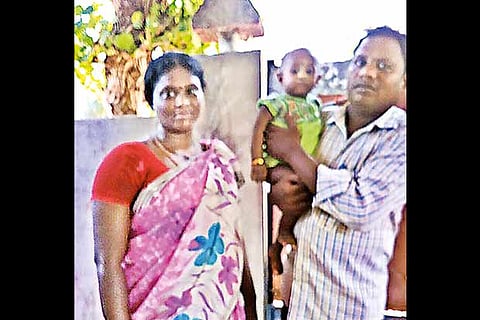 Sakthivel and Kavitha with their girl baby