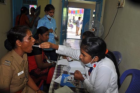 Members of the police force at a medical camp conducted for police personnel and their families