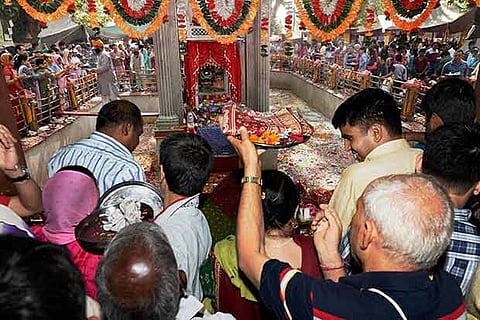 Kashmiri Pandits offering prayers at the Kheer Bhawani temple in Srinagar on Sunday