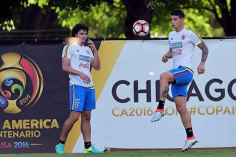 Colombia?s Stefan Moreno (left) and James Rodriguez practise during a training session