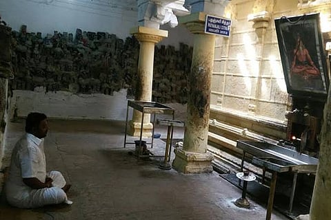 A devotee seen meditating on yoga day where Pathanjali Maharishi is said to have attained sammadhi