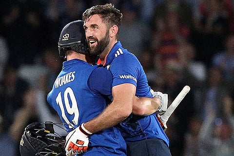 Liam Plunkett (right) with Chris Woakes after the tied match