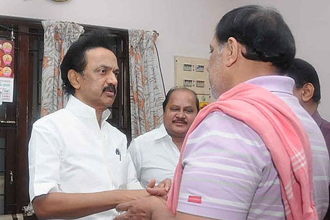DMK Treasurer MK Stalin with the grieving family members of Swathi