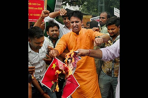 Members of Swadeshi Jagaran Manch protest near the Chinese Embassy in New Delhi