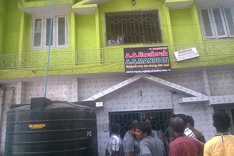 People throng the AS mansion located in Choolaimedu on Saturday morning