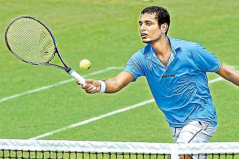 Ramkumar Ramanathan playing the first singles for India against Korea in Davis Cup on Friday
