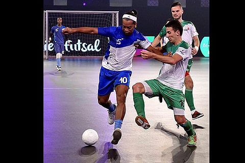 Former Brazilian footballer and Goa 5's team captain Ronaldhino in action against Bengaluru 5's