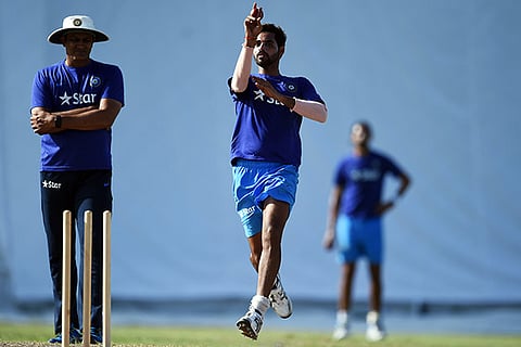 Coach Anil Kumble watches Bhuvaneshwar Kumar in action
