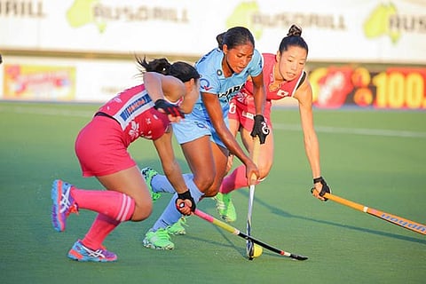 India?s Lilima Minz (centre), who scored the matchwinner, is marked by US defenders on either side