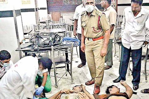 Doctors trying to resuscitate the victims after they got asphyxiated while entering a sump