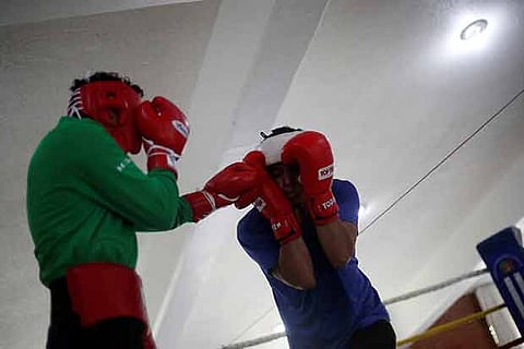 Juan Pablo Romero (R) of Brazil during training