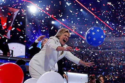 Democratic presidential nominee Hillary Clinton celebrates after addressing delegates