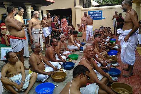 A group of men paying obeisance to their forefathers in Chennai on Tuesday