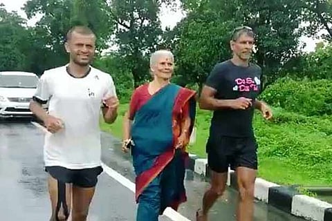 Milind Soman?s mom runs with him wearing a sari