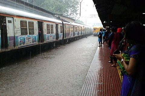 The suburban train services were affected after heavy rains submerged the tracks in Mumbai