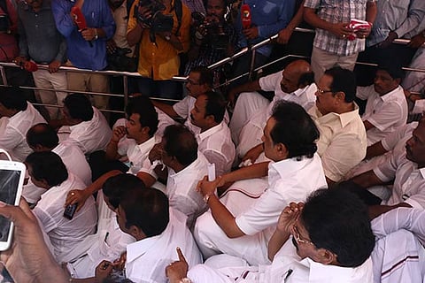 A file photo of DMK MLAs sitting on a dharna after being suspended by the Speaker