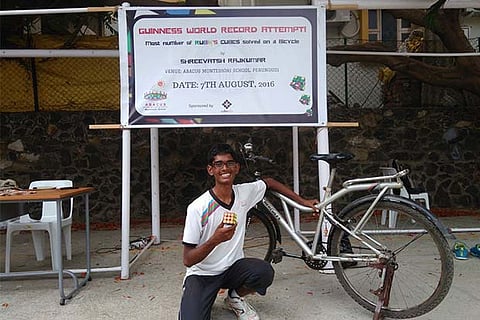 Shreevatsh Rajkumar poses with his Rubik?s Cube