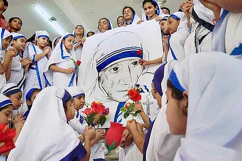 Schoolgirls dressed up as nuns pay tribute to Mother Teresa in Moradabad