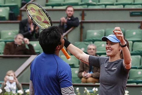 Leander Paes and Martina Hingis after their first-round match on Thursday