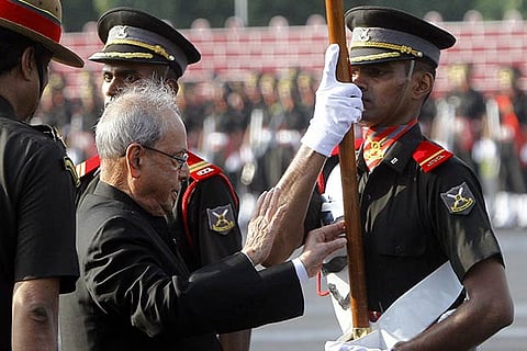 Pranab Mukherjee presents the ?Sword of Honour? to AUO Varun Singh Chauhan (Photo: S Selvaraj)