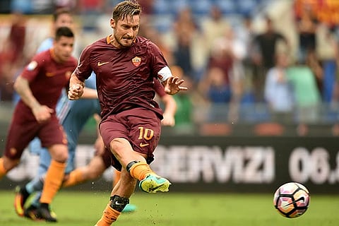 Roma forward Francesco Totti kicks to score on a penalty against Sampdoria