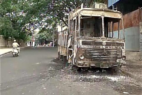 A vehicle was burnt following the unrest in Bengaluru over Cauvery water sharing