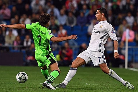 Cristiano Ronaldo (right) scores for Real Madrid