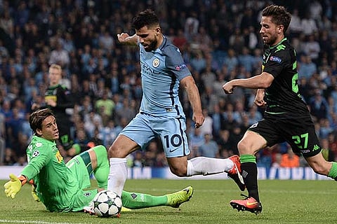 Aguero scores one of his three goals for Manchester City