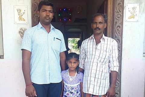 Maisha (C) with her maternal uncle M Seenu (L) and paternal uncle GMuthu (R)