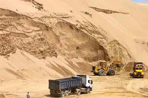 Public besiege lorries used for sand mining