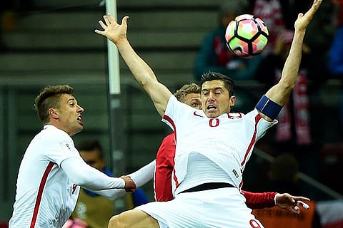 Lewandowski sizzles in Poland win