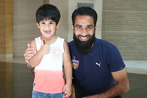Wadoo with his son in Chennai (Photo: Manivasagan Namasivayam)