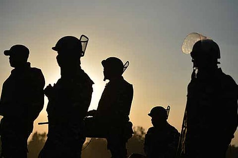 Indian troopers were seen near a building where suspected militants are thought to be hiding