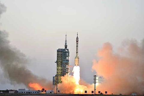 China's Long March-2F carrier rocket transporting the manned spacecraft Shenzhou-11