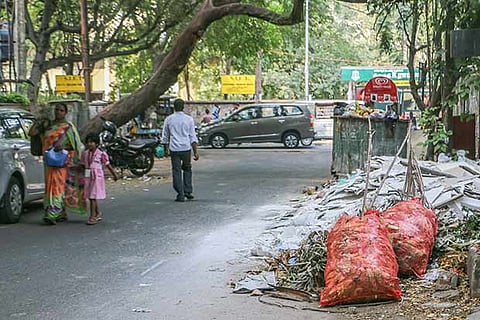 Construction debris and garbage thrown mindlessly on the road in Teynampet (Image: Justin George)