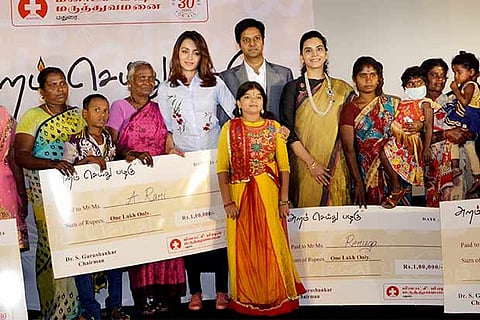 Actress Trisha (centre) along with people who had received treatment at the hospital