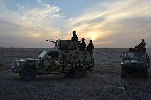 Iraqi army vehicles are seen during an operation to attack Islamic State militants in Mosul