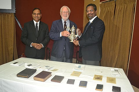 John Murray Braidwood handing over the relics to Alexander Jesudasan, Principal, MCC
