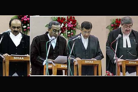 (From left) Judges N Sathiskumar, RMT Teekaaraman and N Seshasayee being sworn in by Justice Sanjay