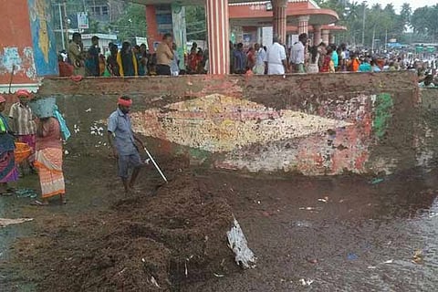 The mud and dust accumulated at Agni Thirtham , where pilgrims take a holy dip