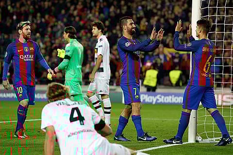 Arda Turan celebrates after scoring his third goal