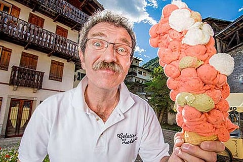 Dimitri Panciera with 121 ice cream scoops at the festival in Italy (Source: Guinness World Record)