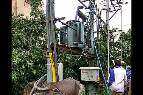 A damaged transformer is monitored by the EB officials in Chennai