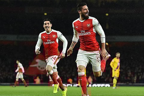 Arsenal striker Olivier Giroud celebrates scoring his team?s first goal